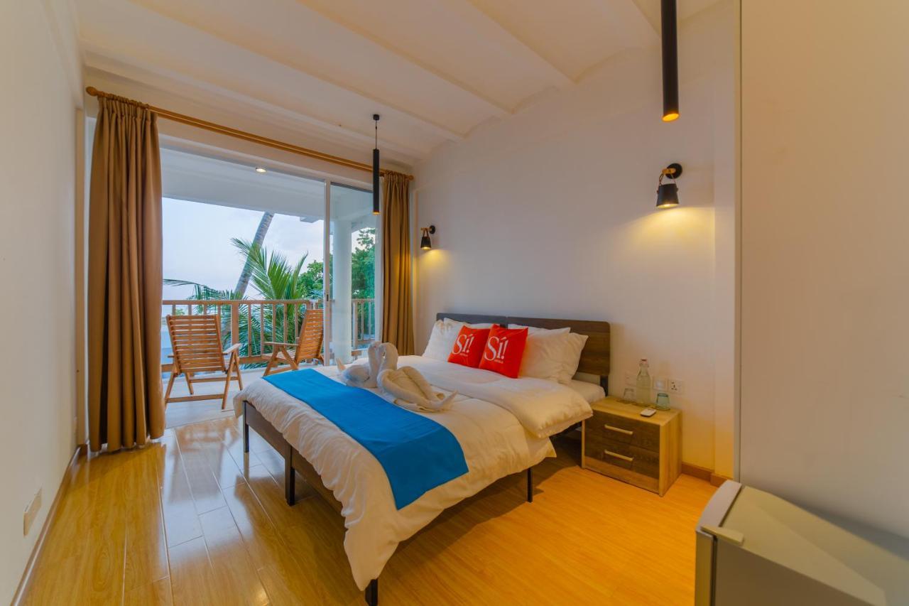 Coral Inn Тулусдоо Екстериор снимка